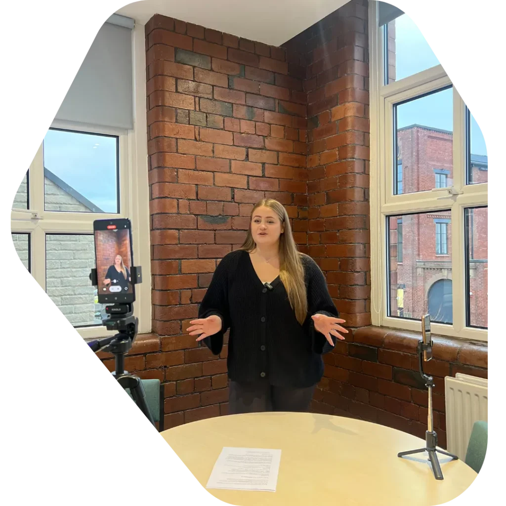 Olivia Rock recording a TikTok