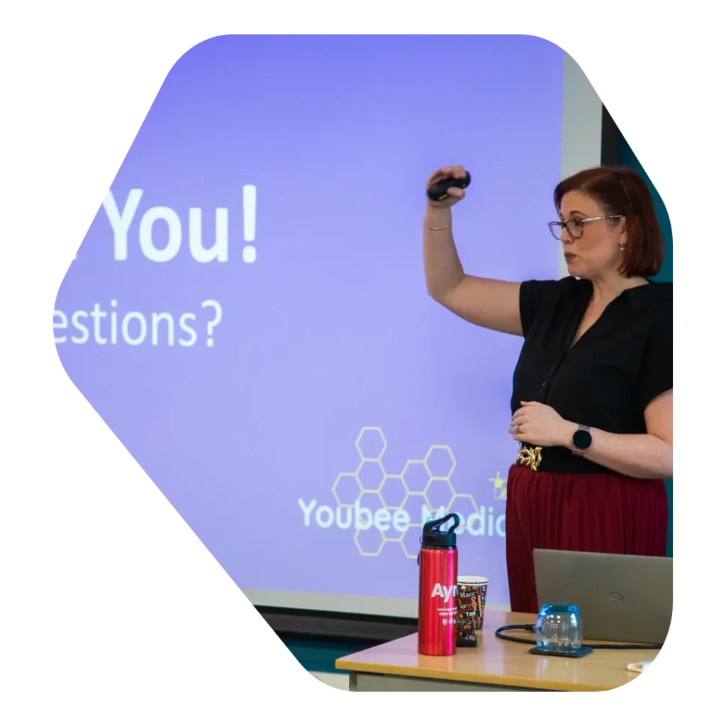 Becky at a marketing workshop presenting 