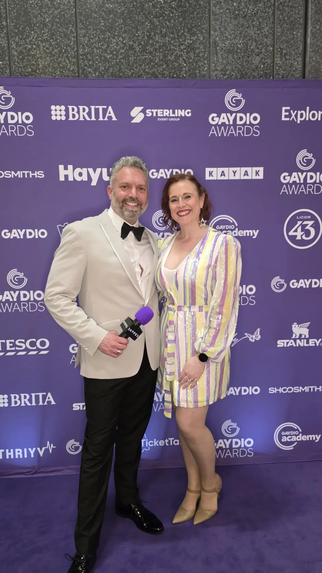 Matt Jameson and Rebecca Hopwood on the purple carpet for the 2026 Gaydio Awards